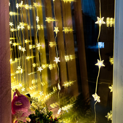 Гирлянда светодиодная 3х2 м 130 led занавес 10 нитей с кольцом звездочки желтый NP-1282 Fex