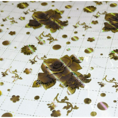 Клеенка силиконовая 1,2*20 м 0,7 мм пунктирная клетка на прозрачном с золотыми розами Baizheng