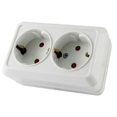 Розетка двойная 2П+З открытой установки с з/ш IP20 16А, белый Розетка двойная 2П+З открытой установки с з/ш IP20 16А, белый